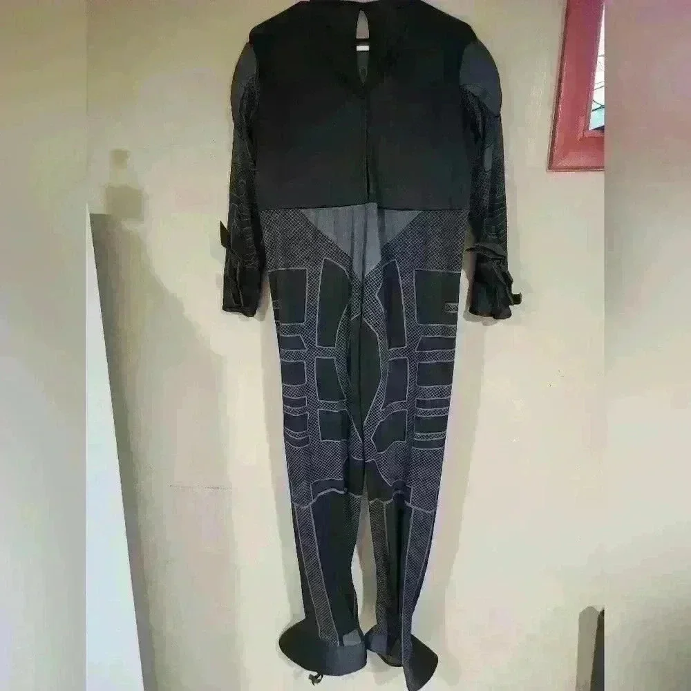 The dark knight Batman costume kids size large may fit XL